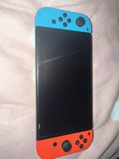 Nintendo Switch Console, Comes With Two Cases Good Condition