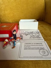 Pixi margerin lucien sur sa pétrolette type tintin