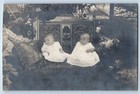 c1910's Twin Babies Sat On Sofa Eastlake RPPC Photo Posted Antique Postcard