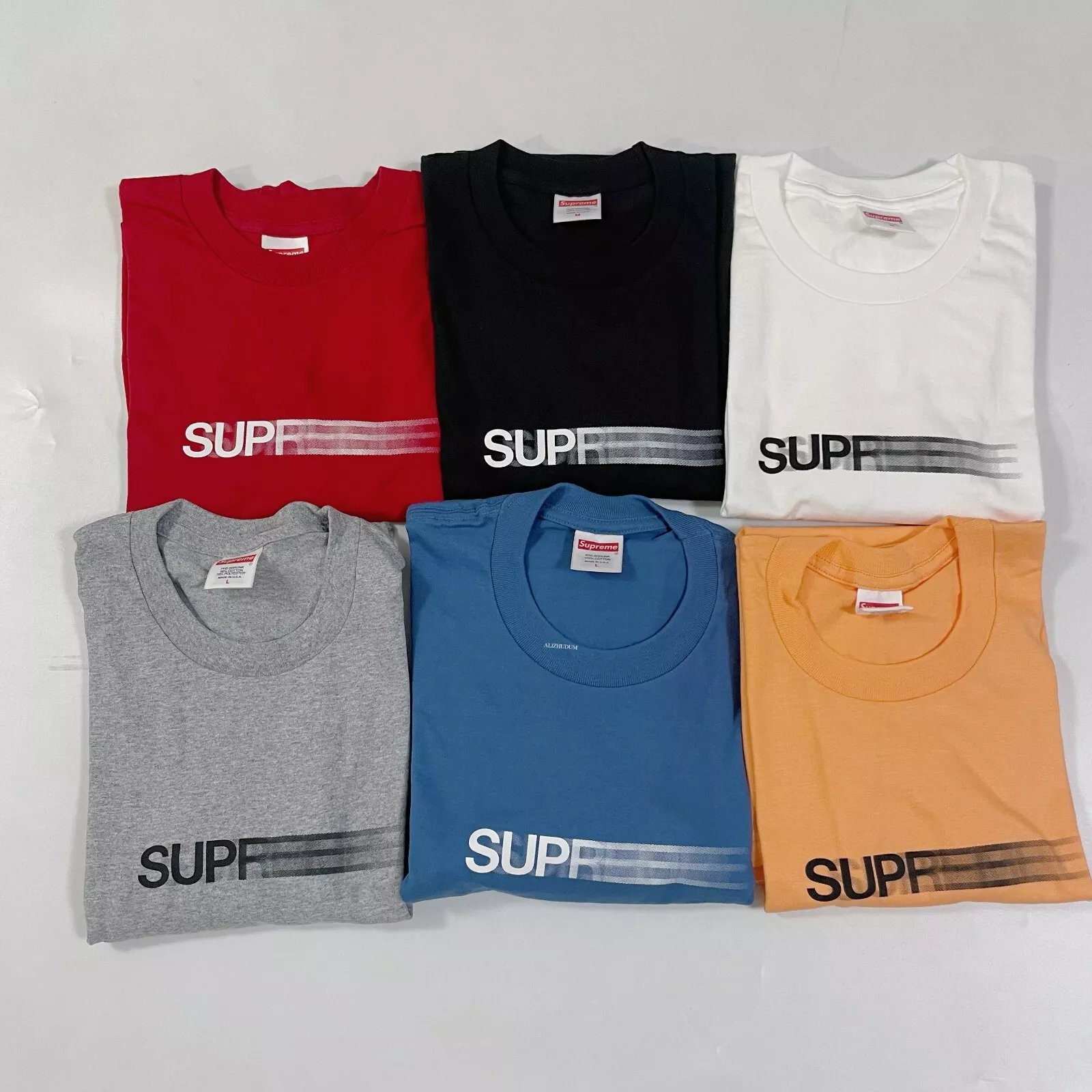 TEE LOGO SUPREME SS23 MOTION NOIR BLANC ROUGE GRIS PÊCHE BLEU
