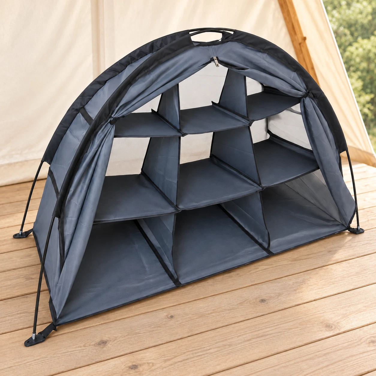 Dark gray nine-compartment camping organizer in a sheltered setting