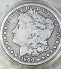 1900 S Morgan Silver Dollar 1 ea - 90 % Pure Silver - Rich Toning - In Capsule