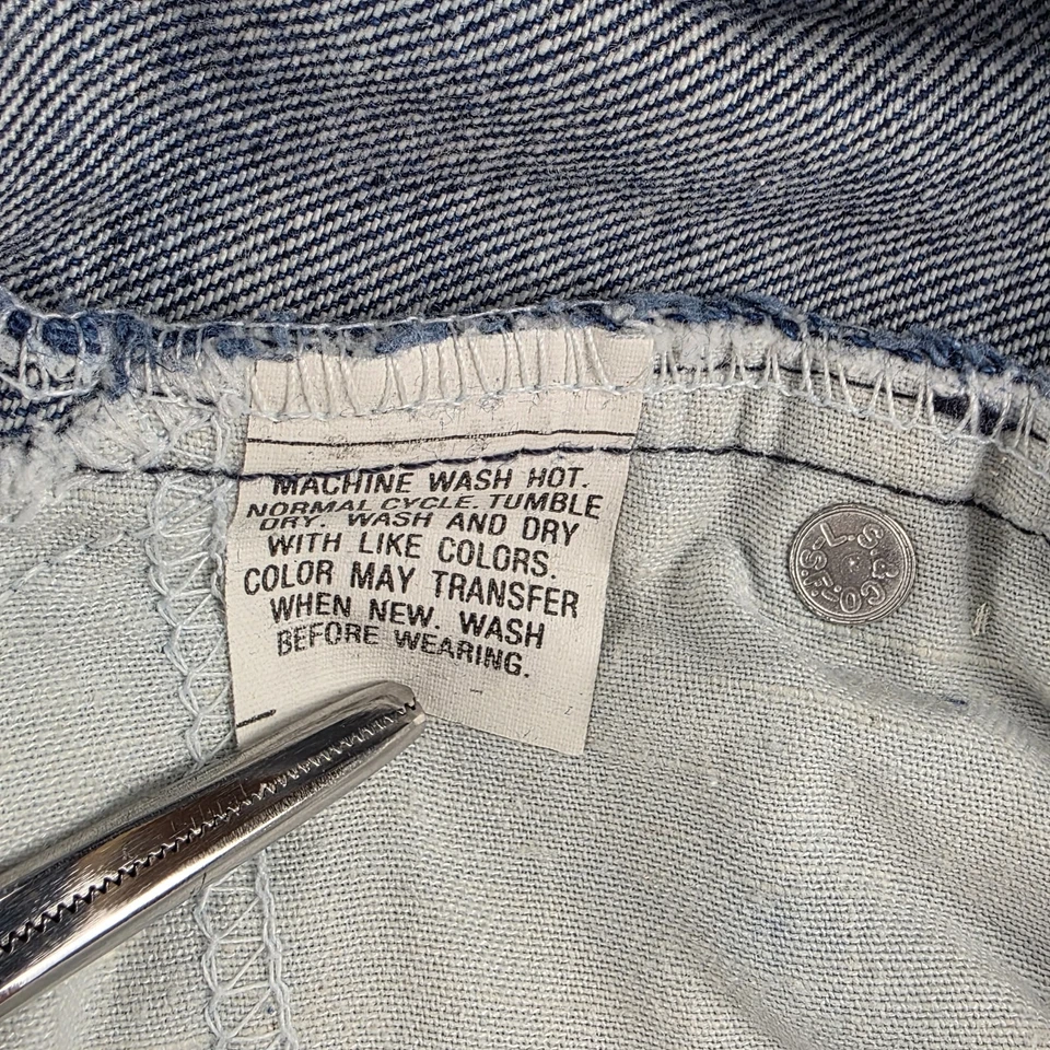 Pantalones de mezclilla vintage años 90 Levi's 20517 0217 Saddleman corte bota para hombre 42x30 pestaña naranja EE. UU. Foto 3 de 4