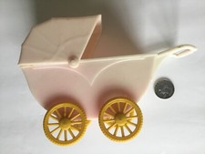 VTG CELLULOID HARD PLASTIC BABY CARRIAGE PINK YELLOW DOLL BUGGY RELIABLE CANADA