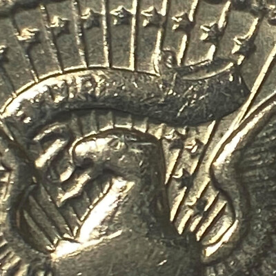 1974 D Kennedy Half Dollar error-StruckThru missing part of E Pluribus Unum