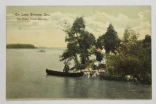 On Lake Simcoe Ont Grand Trunk Railway Postcard Canoe People Dog c1907