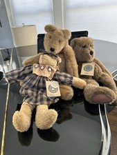 3 Boyd  s bears, one  Travis,  one  Nellie,  one name unknown.