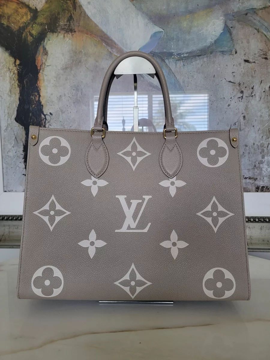 LOUIS VUITTON Onthego MM Tourterelle Cream Monogram Empreinte Leather  Handbag