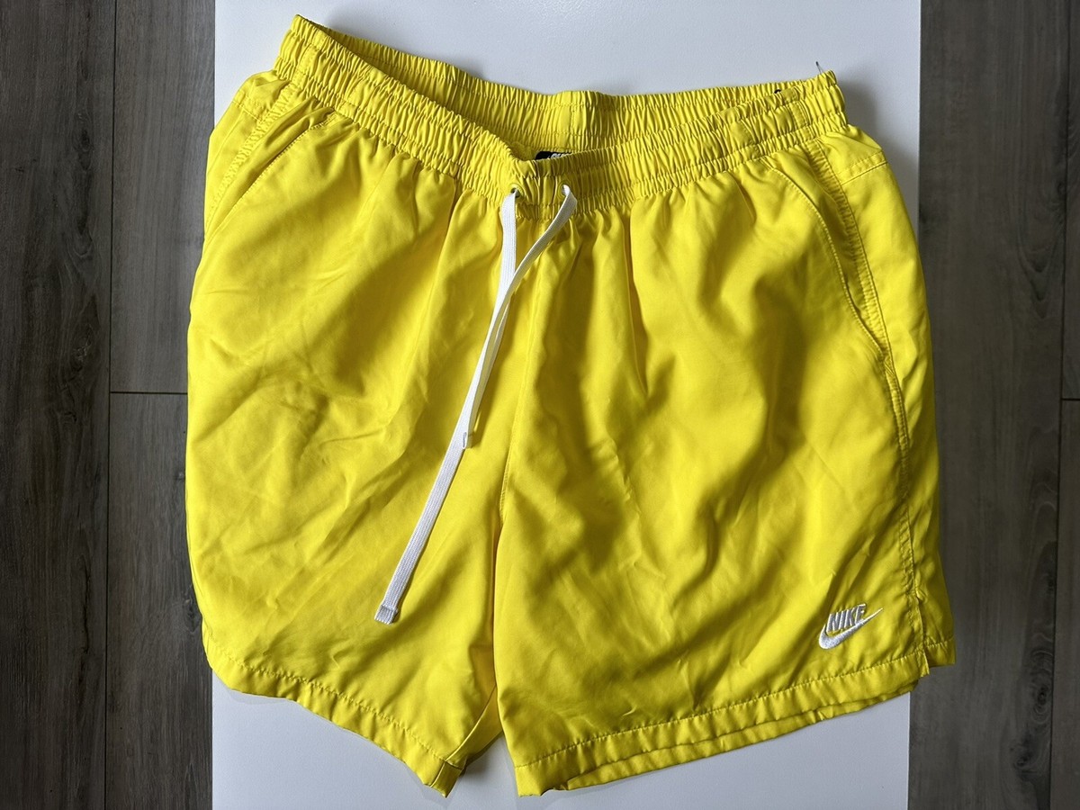 yellow woven nike shorts