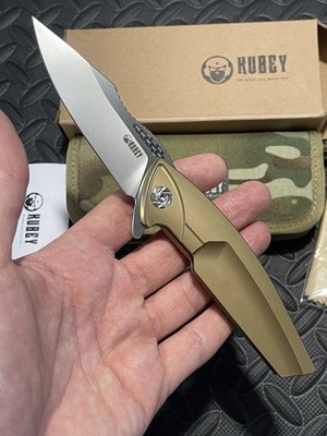 Kubey Knives - KU204A - Gold Titanium Scales w/ a S35VN Blade.