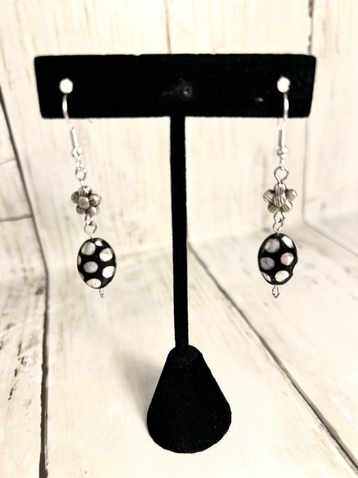 Black and silver dot and flower drop earrings