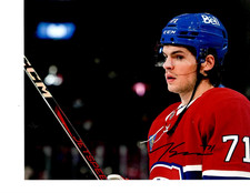 MONTREAL CANADIENS JAKE EVANS SIGNED HOLDING THE STICK 8X10