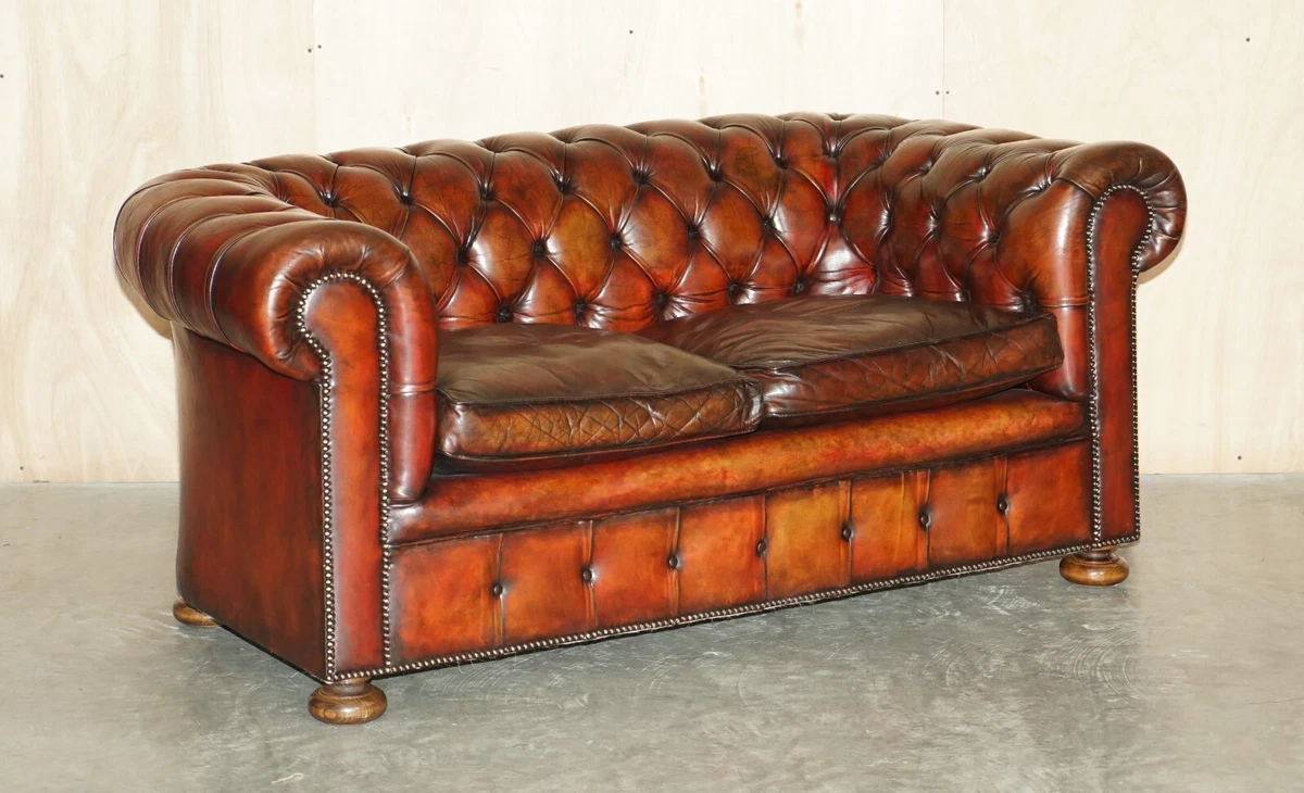 Brown leather tufted sofa deals