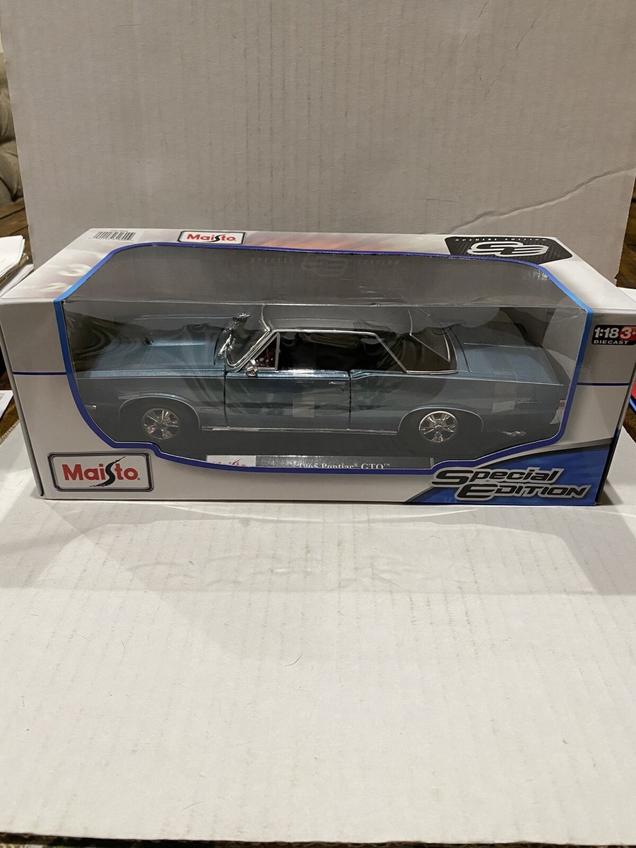 1965 Pontiac GTO ミニカー Maisto 1:18 mai31885.jpg