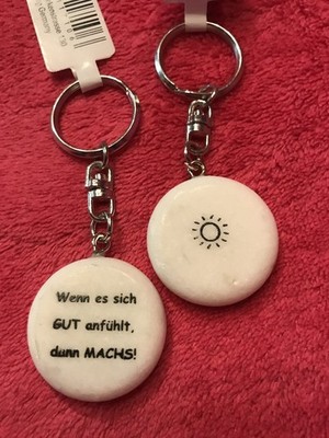 Marble slogan keyring If it feels good, do it!