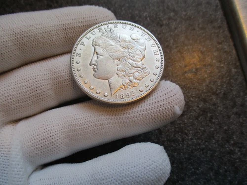 1892's MORGAN SILVER DOLLAR  in VERY NICE XF to AU  condition. RARE DATE!