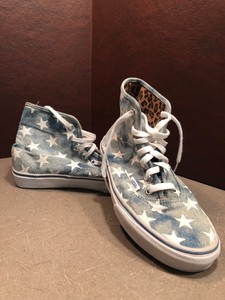 white and leopard print vans