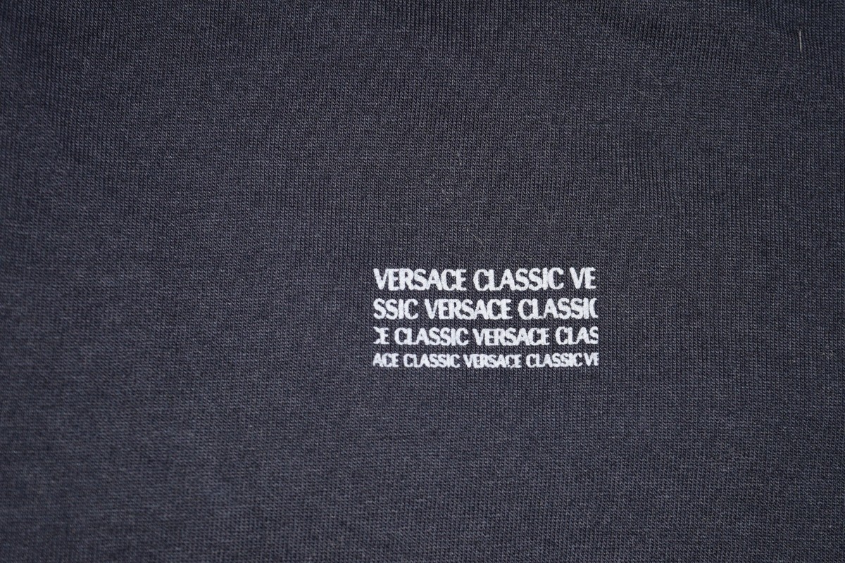 VINTAGE VERSACE CLASSIC 1/4 ZIP SHORT SLEEVE POLO NAVY BLUE VINTAGE VERSACE CLASSIC 1/4 ZIP SHORT SLEEVE POLO NAVY BLUE
