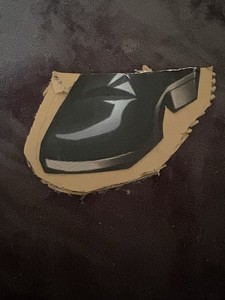 Gojos foot, black, shiny, cardboard,