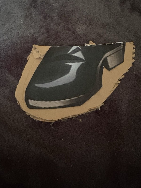 Gojos foot, black, shiny, cardboard,