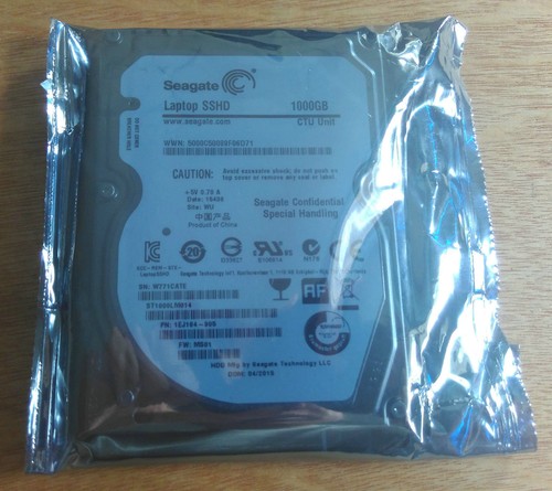 Neu Seagate Solid State Hybrid SSHD ST1000LM014 1 TB 2,5" SATA Laptop nackte Festplatte - Bild 1 von 2