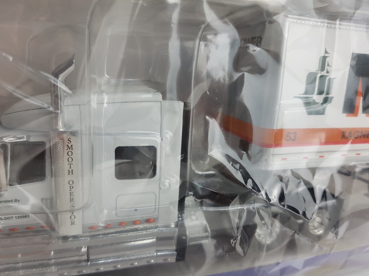 International Lonestar truck trailer 1/43 SEALED diecast International Lonestar truck trailer 1/43 SEALED diecast