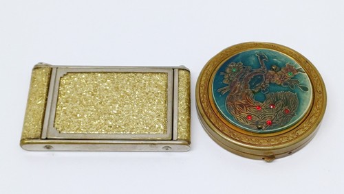 Golden toiletry bag and bronze compact with enamel and vintage engravings
