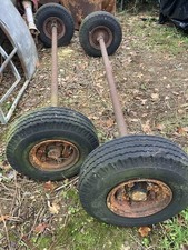 A Pair Of Axles On 700-9 Tyres