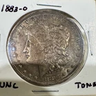 Toned 1883-O Morgan Silver Dollar AU New Orleans Mint