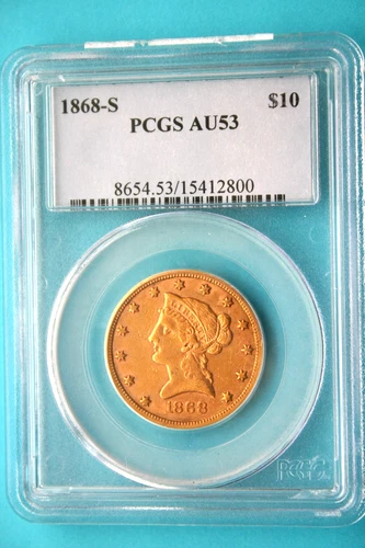 An 1868 s $10 Liberty Eagle Gold Coin. Certified PCGS AU-53.