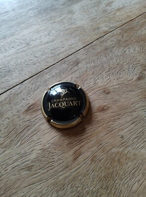 Champagnerkapsel JACQUART schwarz und goldene Kontur