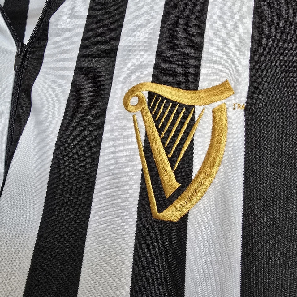 Camiseta deportiva Guinness Rugby Fútbol Árbitro Hombre Grande Negra Blanca Arpa Dorada Foto 4 de 4