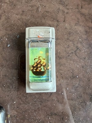 Novelty Lighter Pirate Ship. Please See Description.
