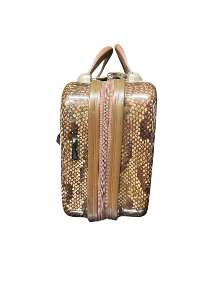 Estuche de maquillaje de equipaje rígido de piel de serpiente HEYS bolsa para pasar la noche Foto 4 de 4