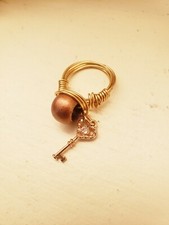 Handmade wire wrap ring with charm Stacie Laurell Crafts size 6-6.5