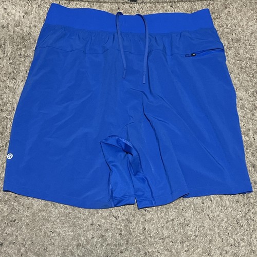 Pantalones Cortos Lululemon Para Hombre Grandes Azul THE Cortos 7" Sin Forro Rendimiento Elastizados - Imagen 8 de 9