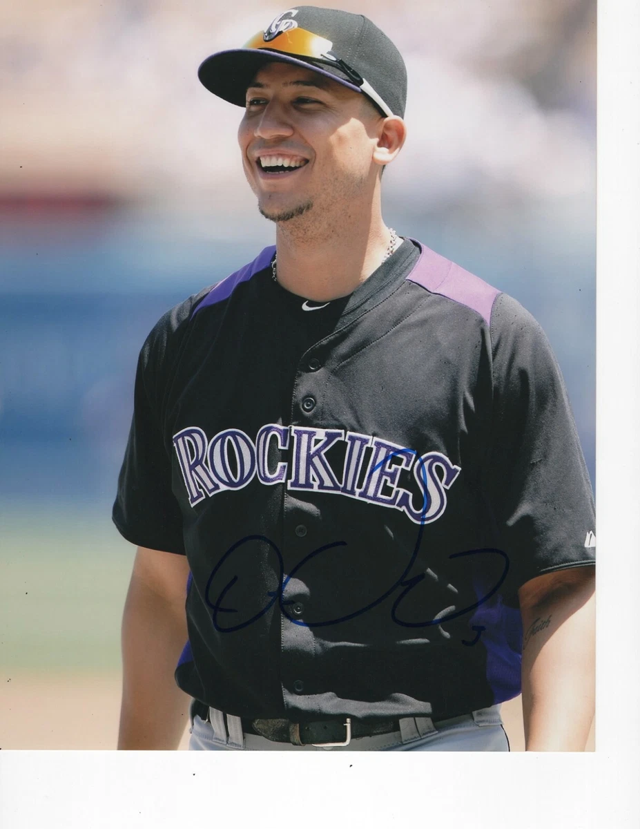 COLORADO ROCKIES CARLOS GONZALEZ SIGNED BLACK JERSEY 8X10