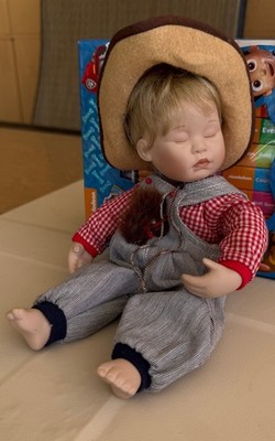  ASHTON-DRAKE GALLERIES - PORCELAIN ''ASLEEP IN THE SADDLE'' BOY DOLL 10'' 
