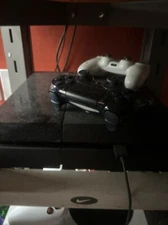 ps4 console 2 controllers and games