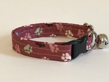PAW PRINTS ON MAUVE ADJUSTABLE BREAKAWAY CAT COLLAR