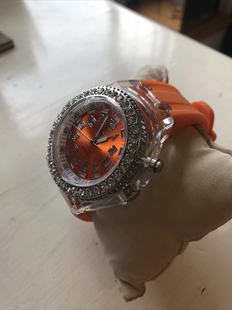 Geneva light up clearance watch