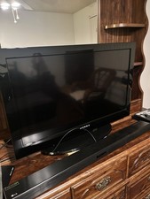 Dynex 32” TV With LG Soundbar And Subwoofer