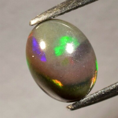 1.53ct 9.6x7.4m Oval Natural Floral Flash Play-Of-Color Crystal Black Opal(Video