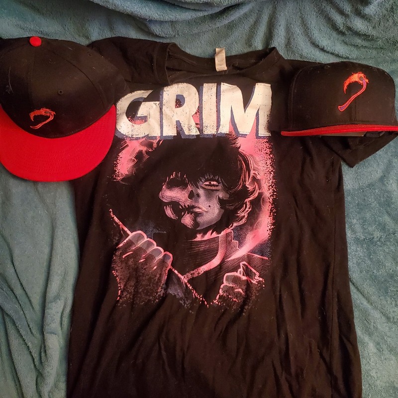 GRIM T-Shirt & SDCC 2023 Exclusive Snapback Hats BOOM! Studios