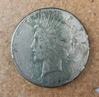 1923 s circulated silver Peace dollar