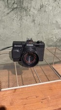 Vintage Quickshot X3000 35mm point and shoot film camera.