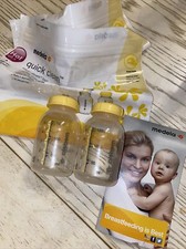 NEW 2 pack Medela Storage Bottles With Lids 5 oz. 2 Quick Clean Micro-steam Bags