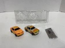 Life Like Thunderbird Slot Car Set of 2 Glow in the Dark with Flames