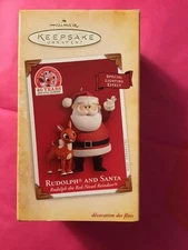 Hallmark Keepsake Ornament 2004 Rudolph and Santa red nosed reindeer 40 years