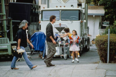 Actor Ted Danson Wearing A Dark Grey Cardigan Grey Checked Trouser- Old Photo